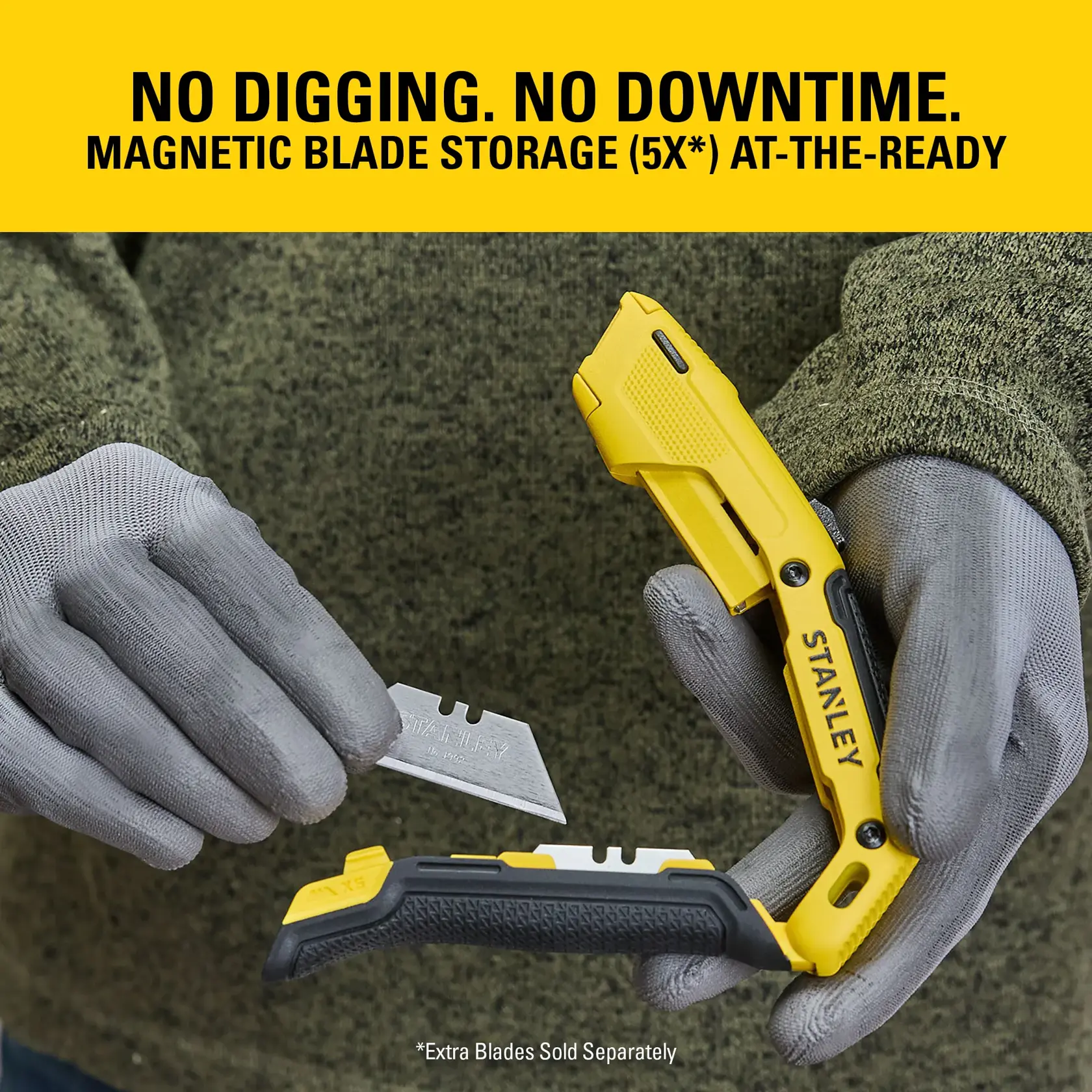 Stanley utility knife with magnetic blade storage and extra blade, held by gloved hands.
