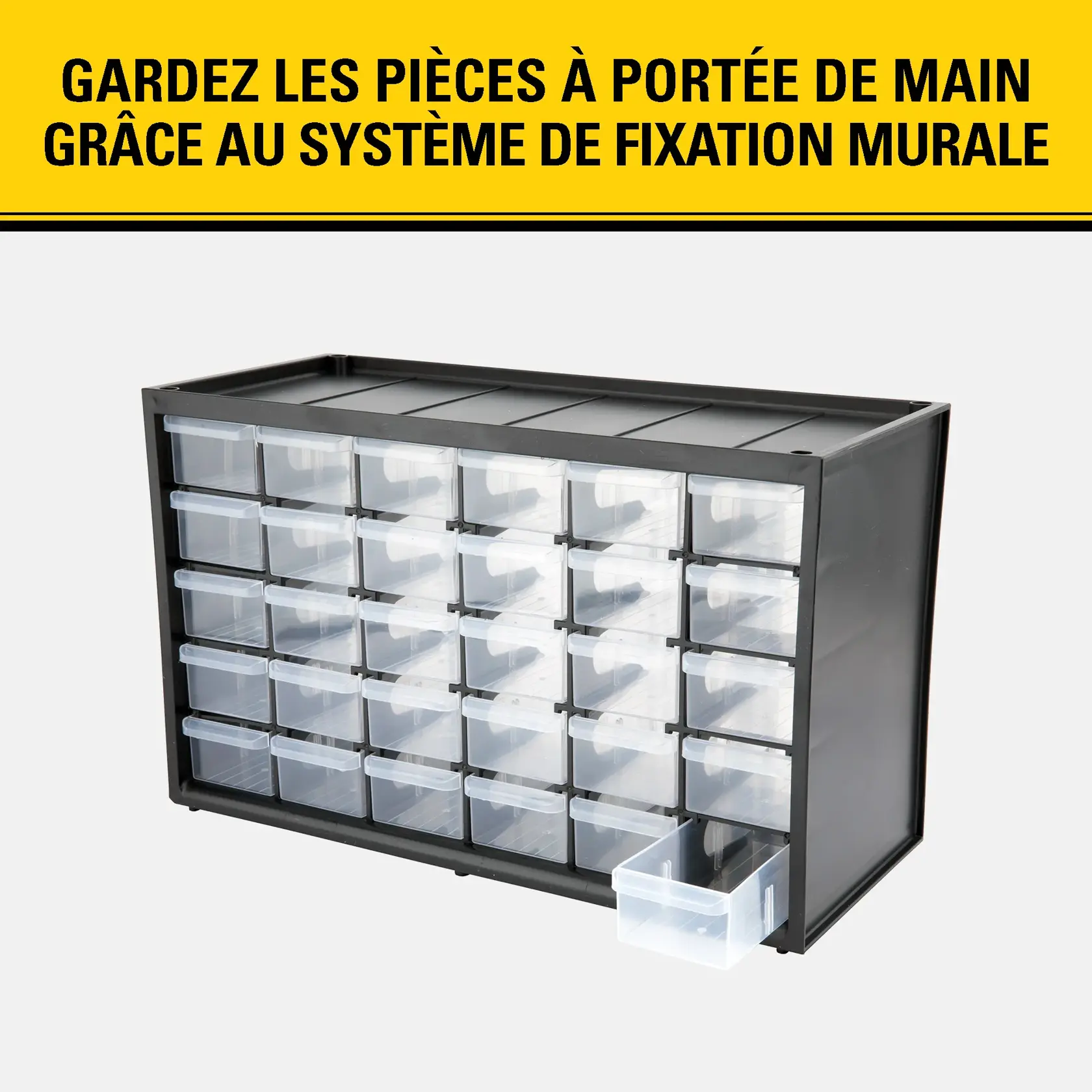 Un organiseur de rangement Stanley noir avec plusieurs tiroirs transparents, dont un légèrement ouvert. En haut, une bannière jaune avec un texte en français mettant en avant la fixation murale pratique.